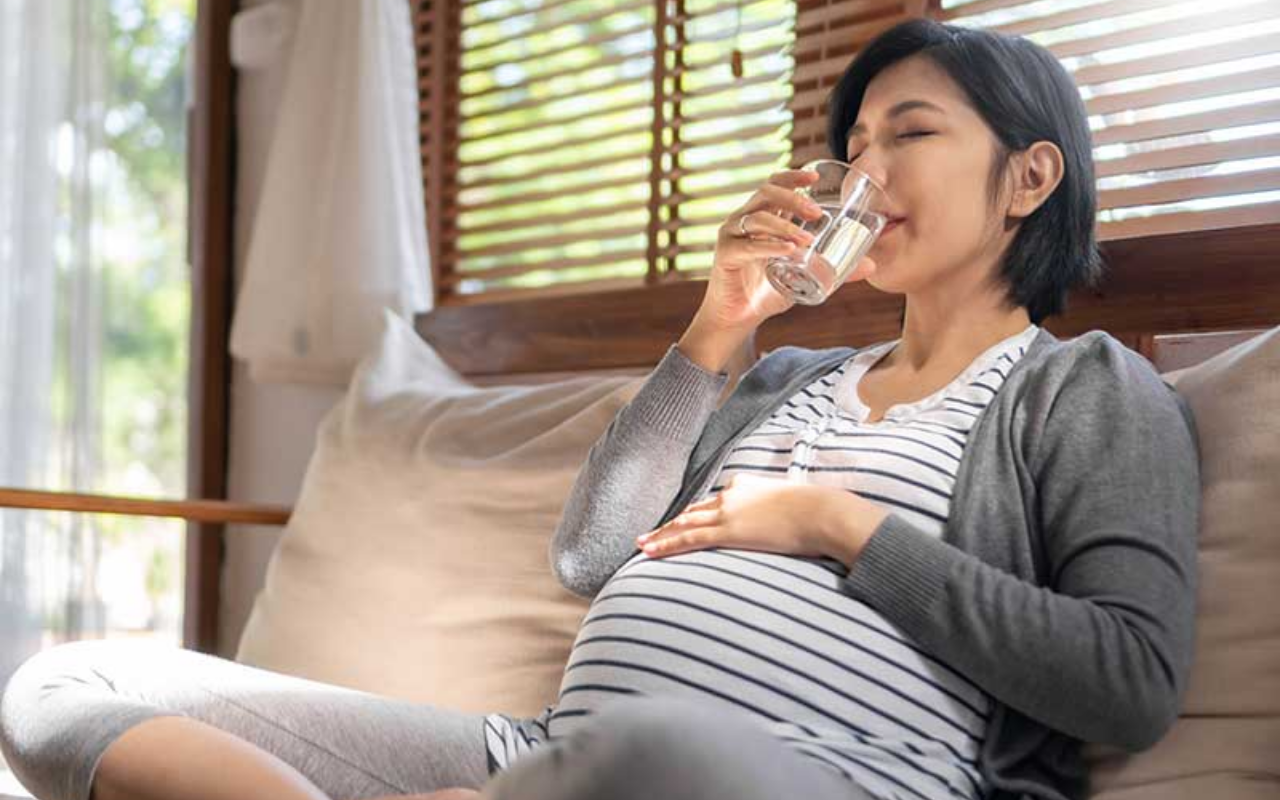 Pregnant Woman Drinking